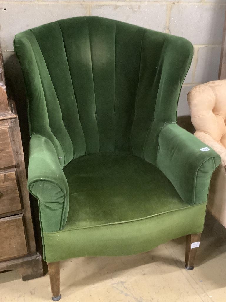 A George III mahogany wing armchair, on squared tapered legs, width 75cm